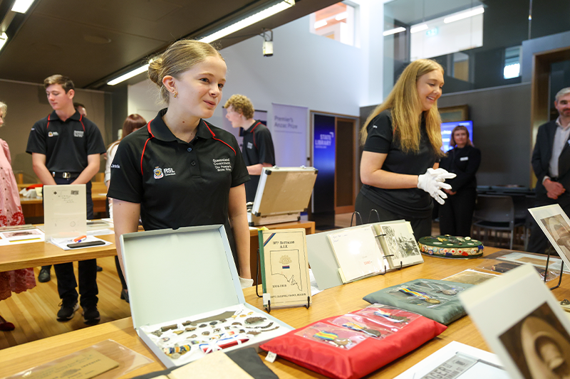 Jessie at the Young Historians' Workshop, State Library of Queensland.jpg Jessie at Villiers-Bretonneux with Sgt Badger's name