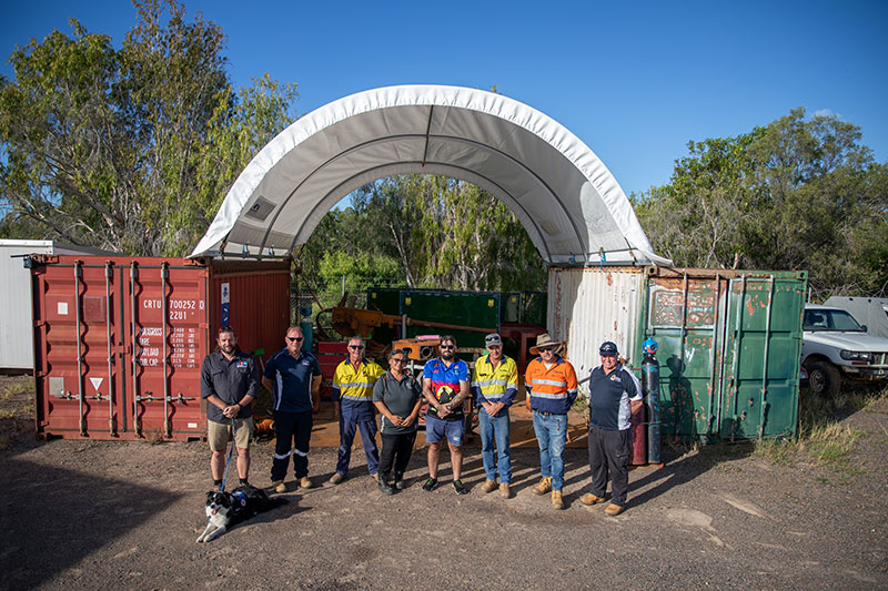 Local veterans and youth with 1942 40mm Bofors gun during restoration work