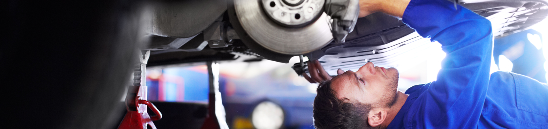 Mechanic working on car