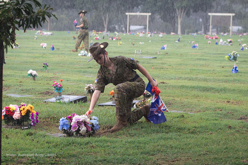 Australian Army Cadet places poppy on ANZAC Day