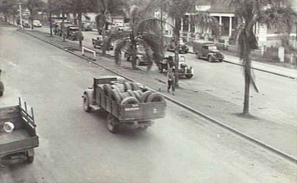 Military vehicles drive along Atherton's main street