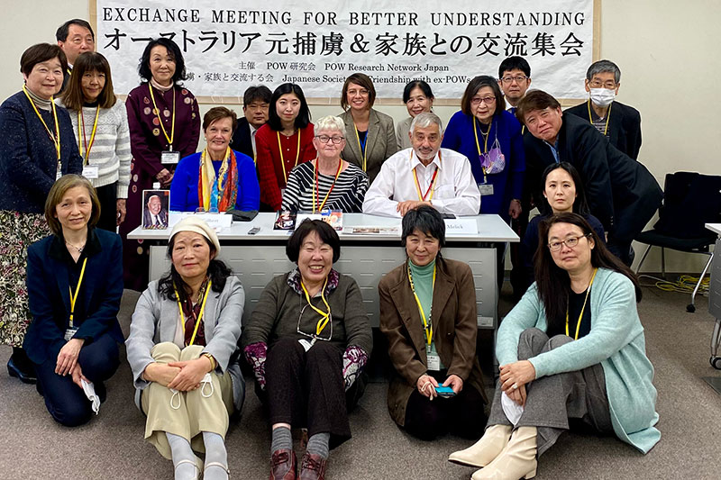 Leigh Gilbert and President of RSL Australia Greg Melick in Japan with Japanese citizens