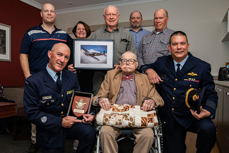 WWII pilot John Shoesmith celebrating his 100th birthday with family and friends 