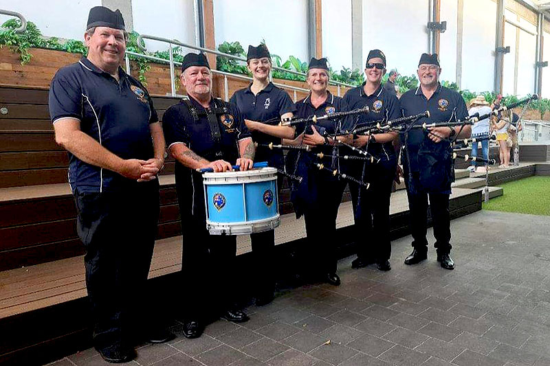 Pipe Major John Major with Veterans and Families Pipe Band