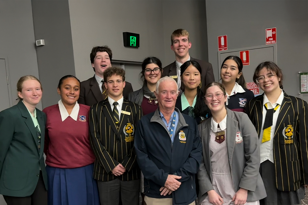 Kedron-Wavell RSL Sub Branch School Liaison Officer Greg Peake OAM and a group of School Liaisons from participating high schools.
