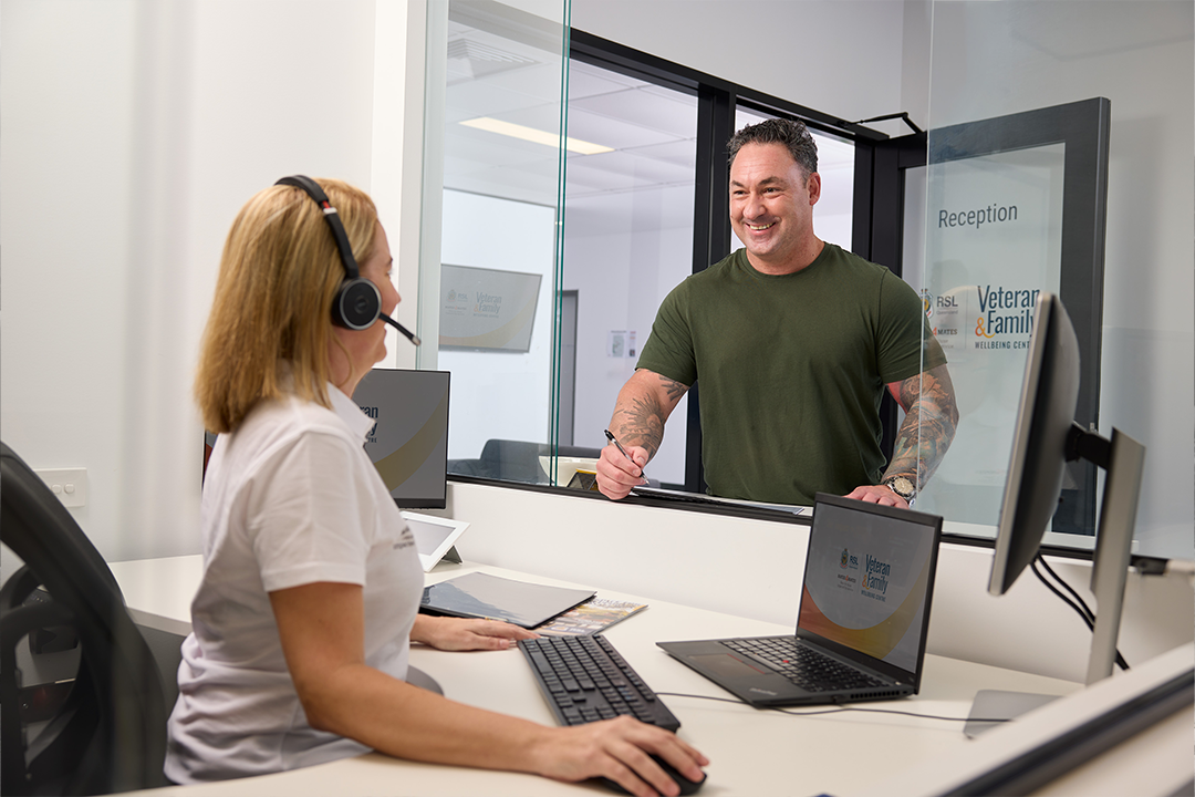 Person talking to a receptionist