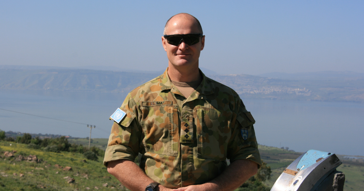 Army veteran Scott Klima in camo at Golan Heights