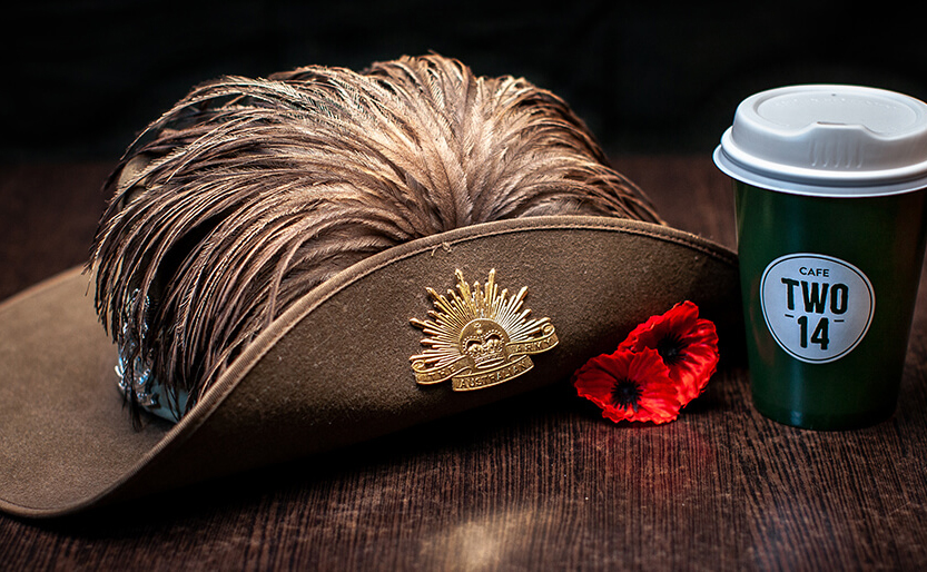 slouch hat and coffee cup