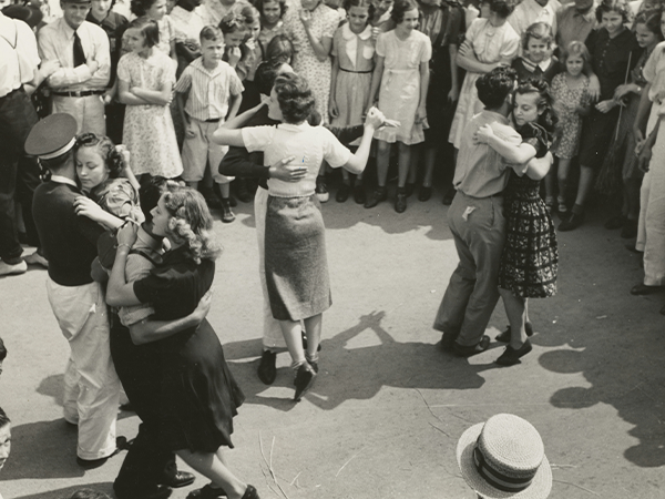 Couples dancing in the street. 